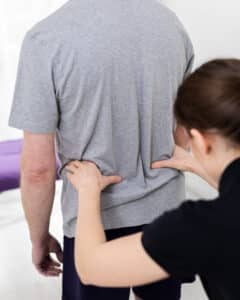 Sciatica can make your lower back painful, but not always.